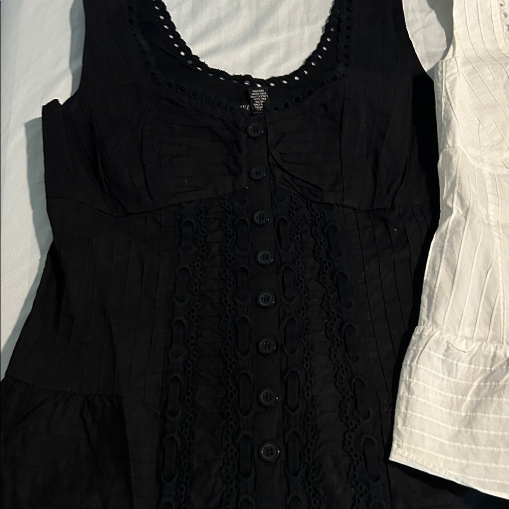 INC from Macys both are size 6 button corset style blouses 100% cotton.
